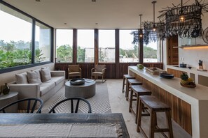 Standard Apartment | Living area | 40-inch Smart TV with digital channels, TV, printers - Unho Tulum (Tulum)