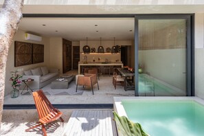 Superior Apartment, Private Pool, Courtyard View | Living area | 40-inch Smart TV with digital channels, TV, printers - Unho Tulum (Tulum)