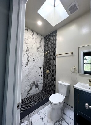 Shower, towels, soap, shampoo