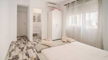 3 slaapkamers, een bureau, een strijkplank/strijkijzer, wifi