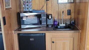 Fridge, coffee/tea maker, cookware/dishes/utensils