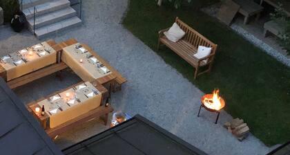 Appartement 'Geigerhaus 500 Jahre - A' avec vue sur les montagnes, sauna partagé et Wi-Fi.
