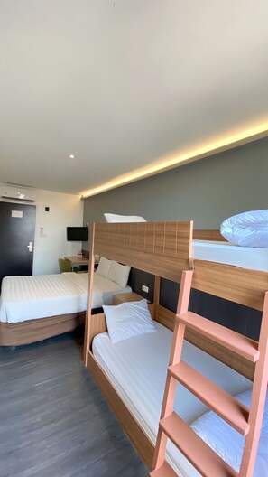 Premium bedding, desk, laptop workspace, free WiFi
