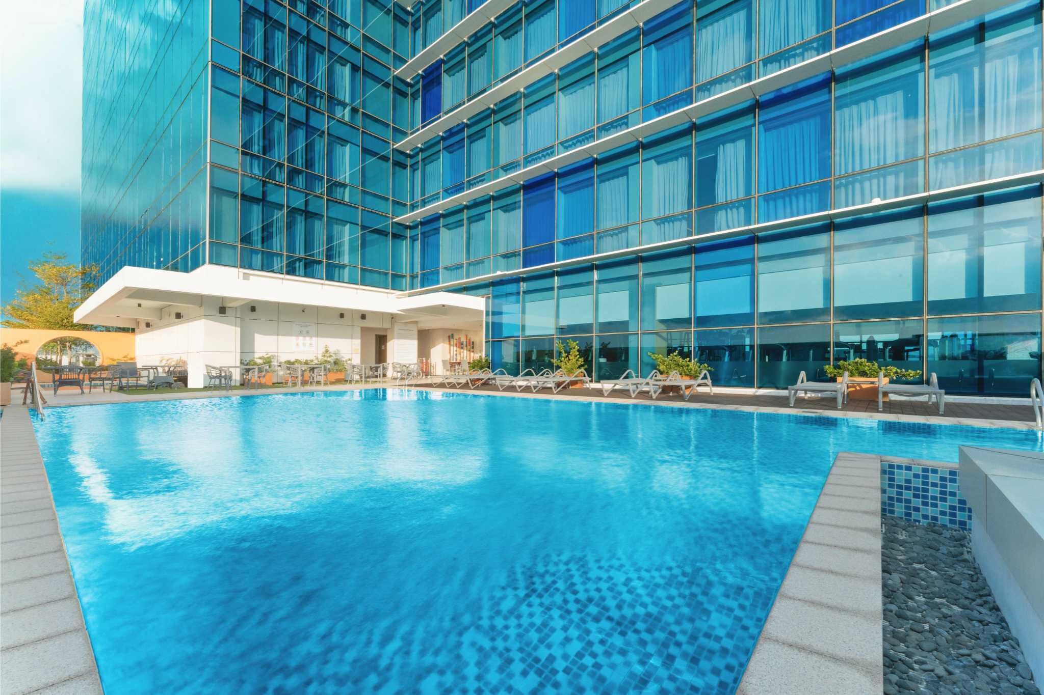 Outdoor pool, open 7:00 AM to 10:00 PM, free pool cabanas, pool loungers