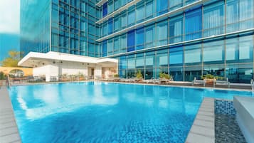 Outdoor pool, open 7:00 AM to 10:00 PM, free pool cabanas, pool loungers