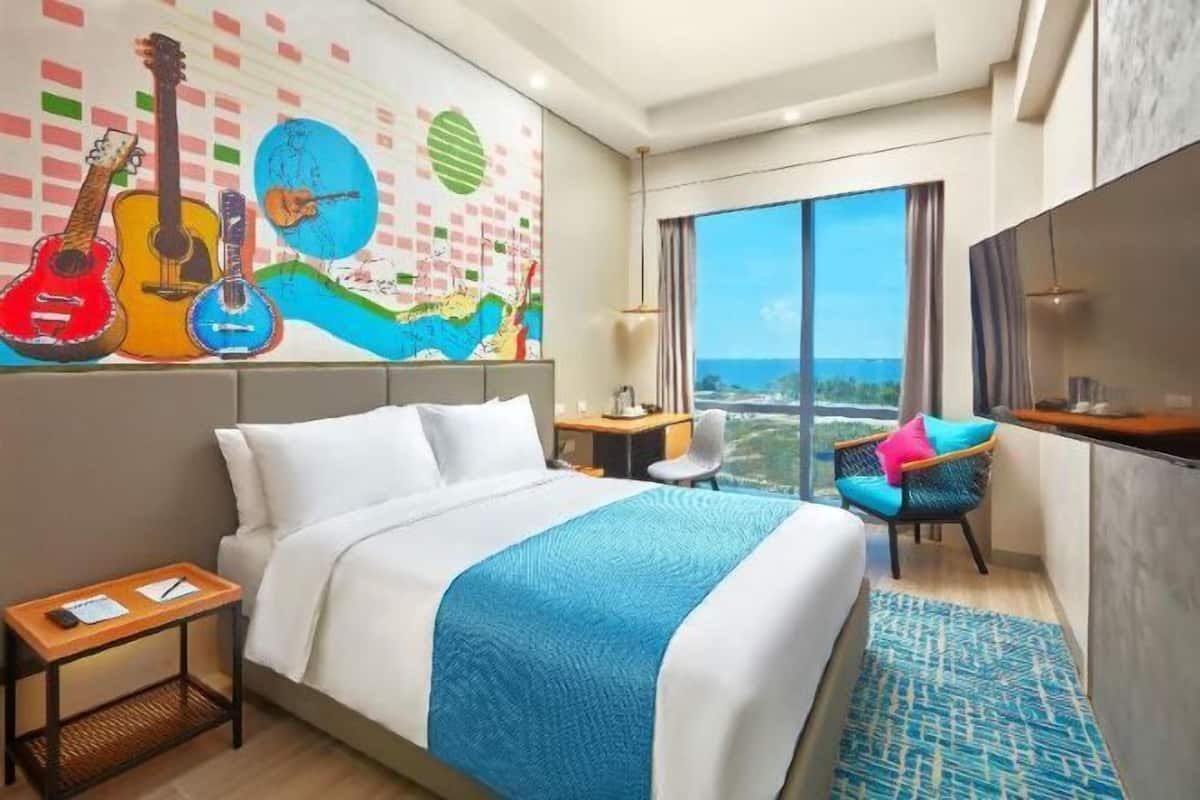 Donzen dekbedden, een minibar, een bureau, gratis babybedden