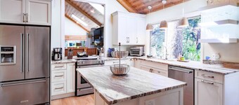 Short Stroll to Beach!  Exquisitely Renovated Home w/ Pool & Hot Tub, Spacious Deck & Lagoon Views!