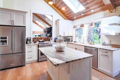 Short Stroll to Beach! Exquisitely Renovated Home w/ Pool & Hot Tub, Spacious Deck & Lagoon Views!