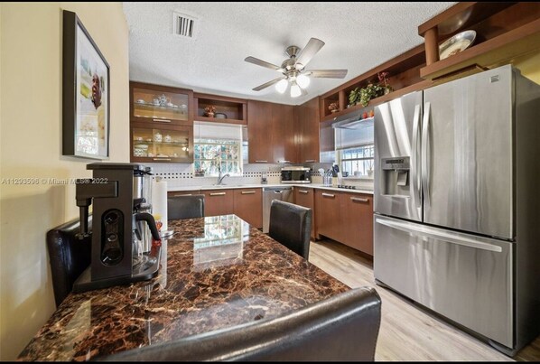 Fridge, stovetop, cookware/dishes/utensils