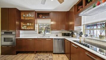 Fridge, stovetop, cookware/dishes/utensils