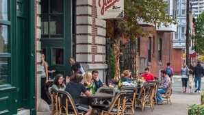A restaurant named "Jack's Firehouse" with outdoor seating and a brick facade. - Spacious 3BR Near Art Museum | Patio | Gameroom (Philadelphia)