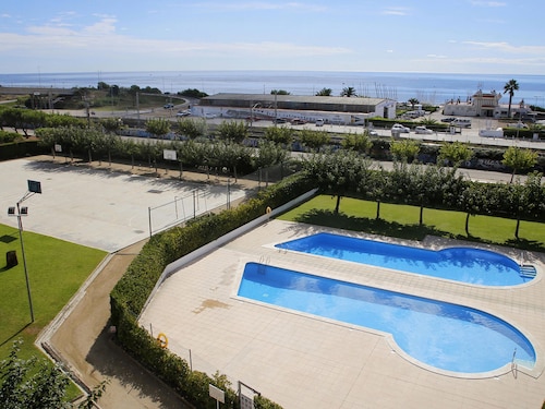 Family Apartment in Torredembarra with Air Conditioning and Pools
