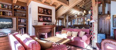 Télévision, cheminée, lecteur de DVD