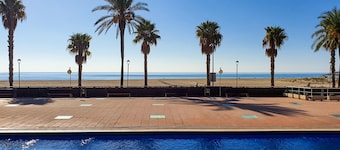 Beachfront Apartment with Parking