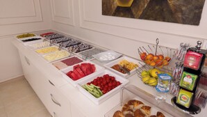 A buffet with various food items including fruits, vegetables, and dairy products. - MY PALACE TUZLA (Tuzla)