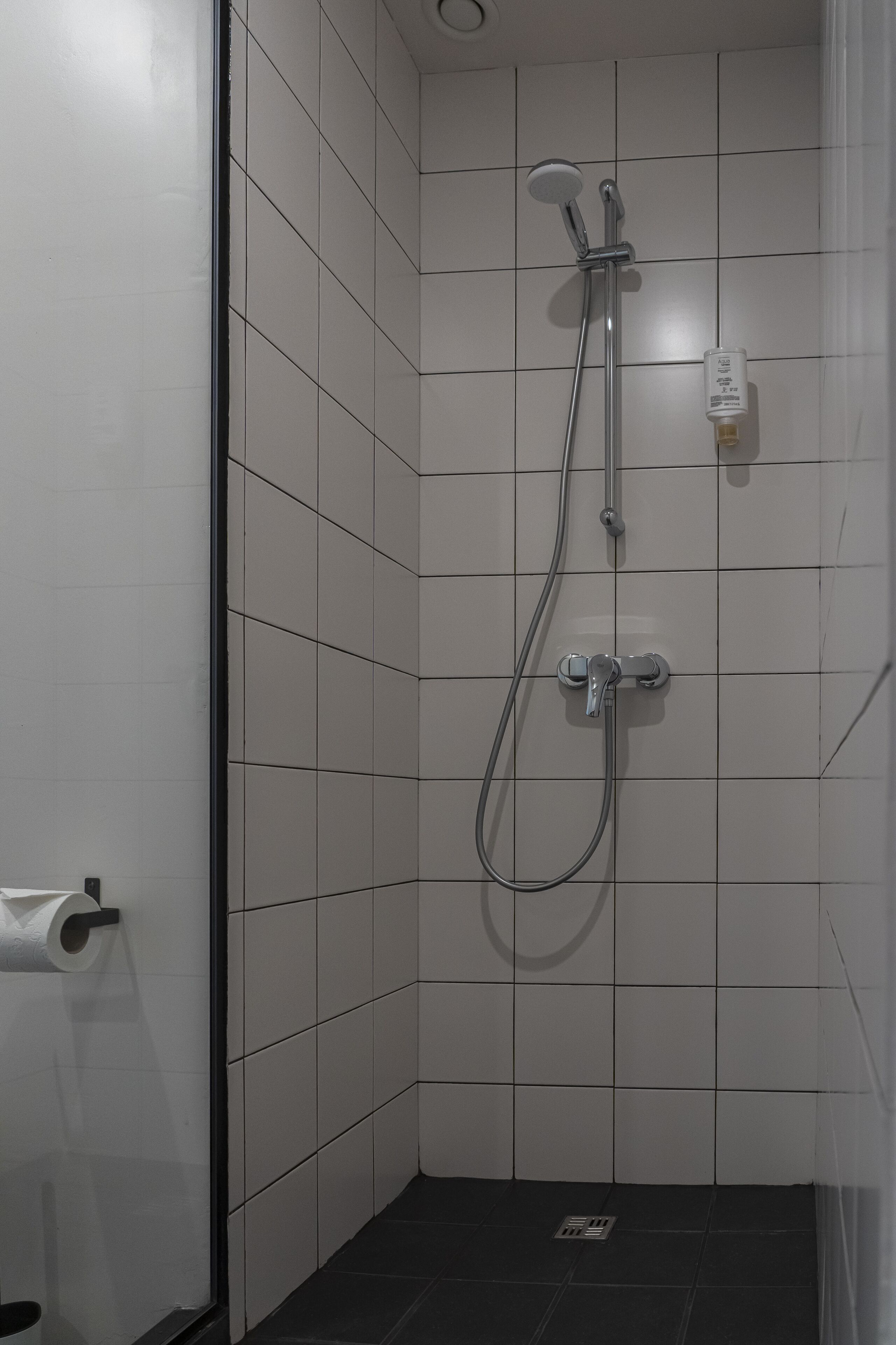 shower, bathrobes, towels, shampoo