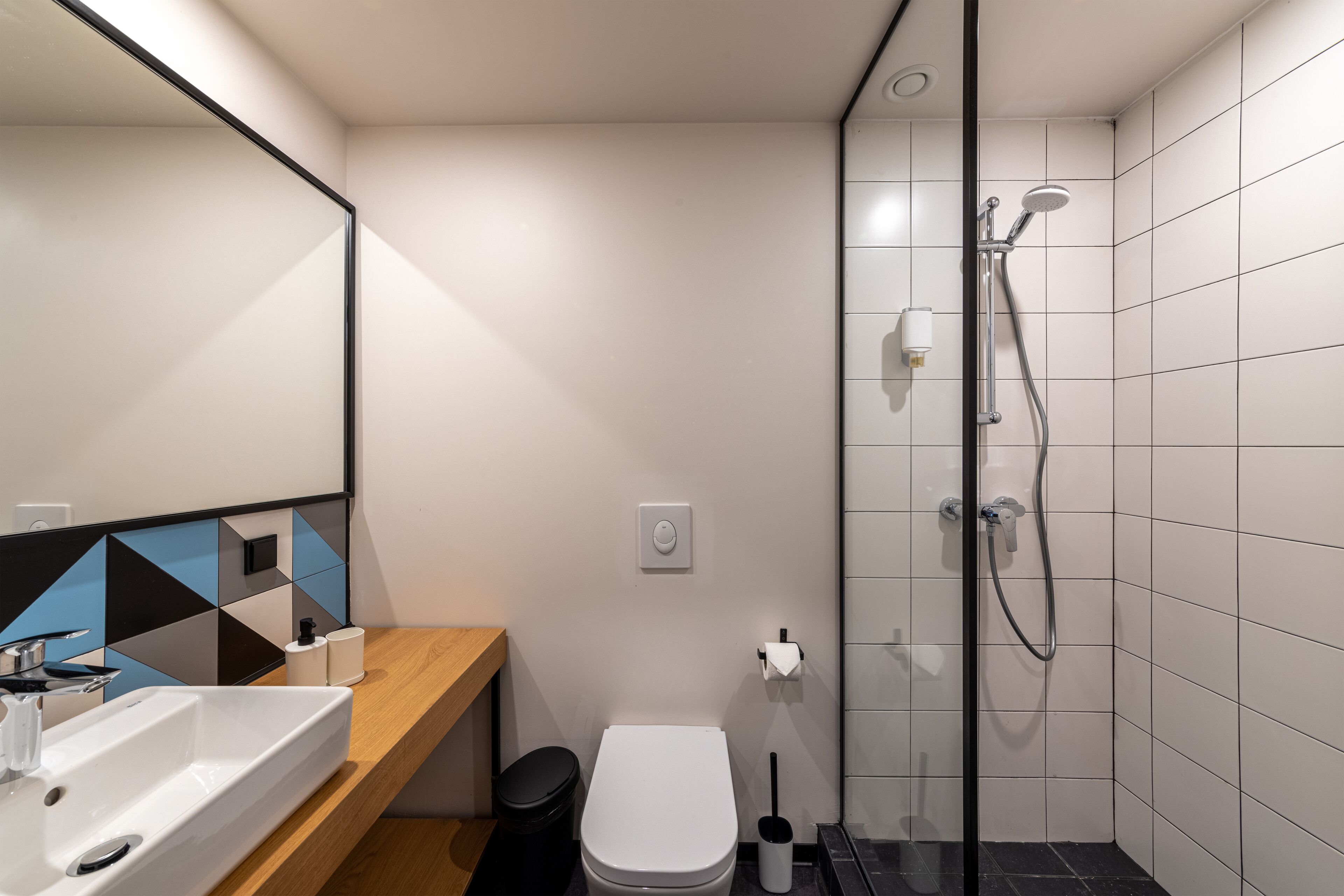 shower, bathrobes, towels, shampoo