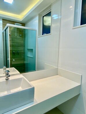 Shower, hair dryer, soap, shampoo
