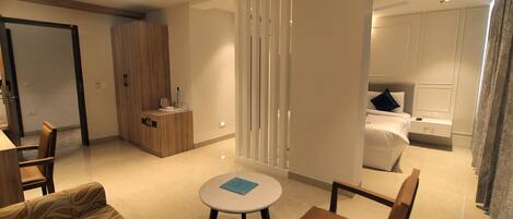 Design Room | Premium bedding, down comforters, memory foam beds, in-room safe