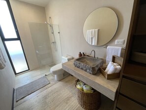 Shower, hair dryer, towels, soap