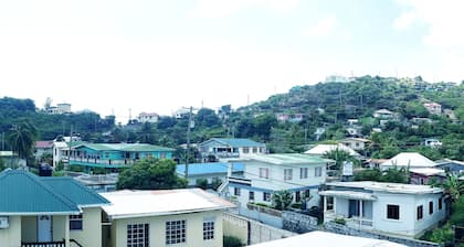 Family styled Apartments/Guest House - 5 minutes walk from the beach.