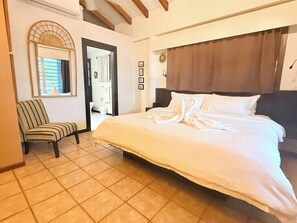 1 bedroom, in-room safe, desk, iron/ironing board - Beachfront 1‑BR with Space, Breeze, and Easy Living. (Maya Beach)