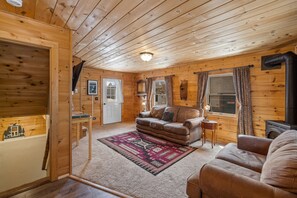 TV, fireplace - Stay at The Bucking Moose (#10) Cowboy Cabin, 2 bedroom cabin just 1 minute from Yellowstone (West Yellowstone)