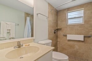 Shower, hair dryer, towels, soap