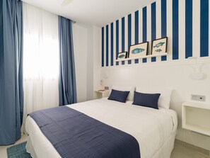 1 habitación, tabla de planchar con plancha, wifi gratis y ropa de cama 