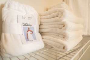 Combined shower/tub, hair dryer, towels, toilet paper