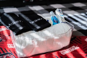 Combined shower/bathtub, hair dryer, towels, toilet paper