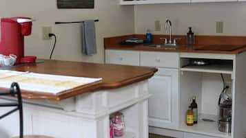 Fridge, microwave, stovetop, cookware/dishes/utensils