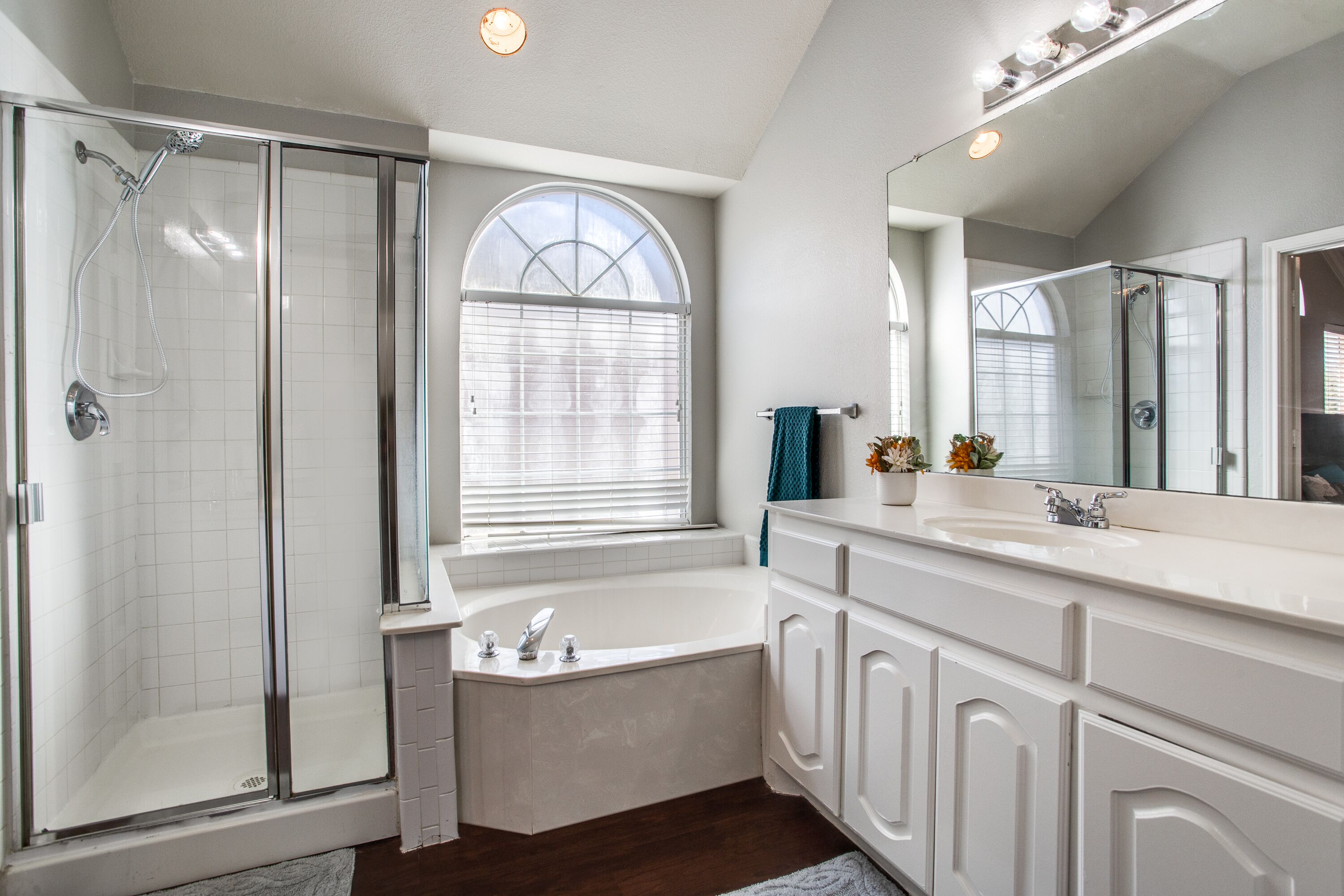 Combined shower/bathtub, towels, toilet paper