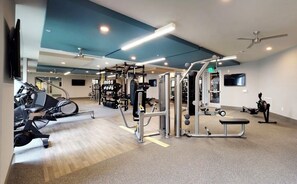 Work out in style with a variety of exercise equipment, including treadmills, weight machines, and free weights.