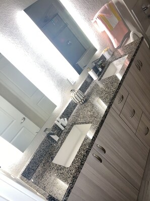 Combined shower/tub