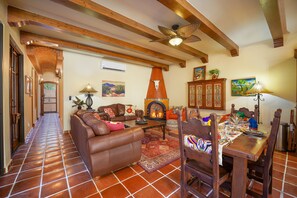 Smart TV, fireplace, books, offices