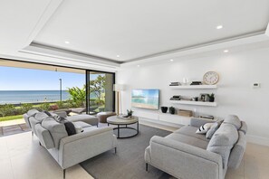 Exclusive Apartment | Living area | 60-inch Smart TV with cable channels - Apartment 03 Noosa Court  (Noosa Heads)