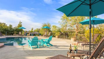 Outdoor pool, open 8:00 AM to 10:00 PM, free cabanas, pool umbrellas