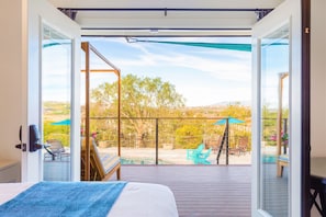 Standard Room, 1 King Bed, Pool View | Terrace/patio