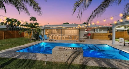 Clean Florida Coastal Design home with Heated Pool, Fireplace and Putt Putt