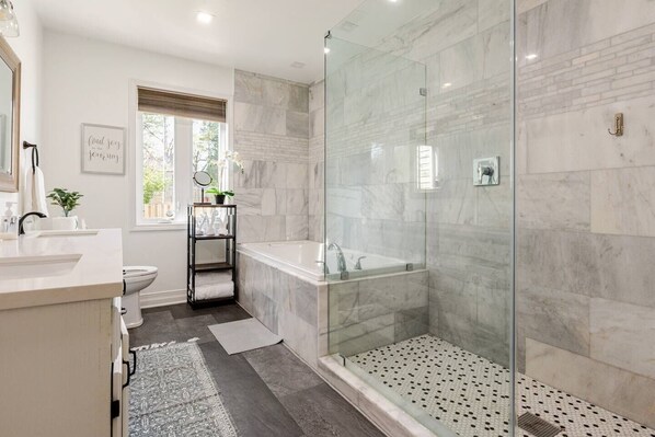 Bathtub, hair dryer, towels, soap