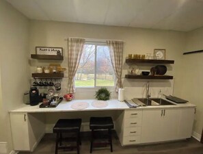 Fridge, microwave, stovetop, coffee/tea maker