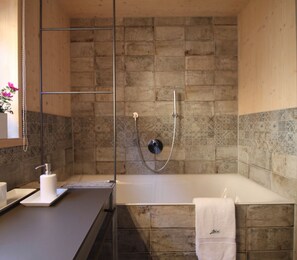 Bathtub, hair dryer, towels