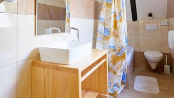 Bathtub, hair dryer