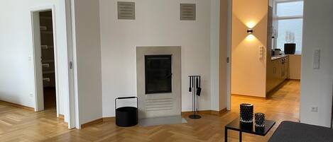 City Suite, Fireplace, City View (including EUR 80 Cleaning Fee) | Living area | 50-inch flat-screen TV with satellite channels, TV