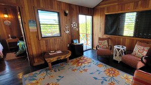 Standard Cottage | Living area | 32-inch Smart TV with digital channels, TV, Netflix - Therapy Cabins (St. George's Caye)