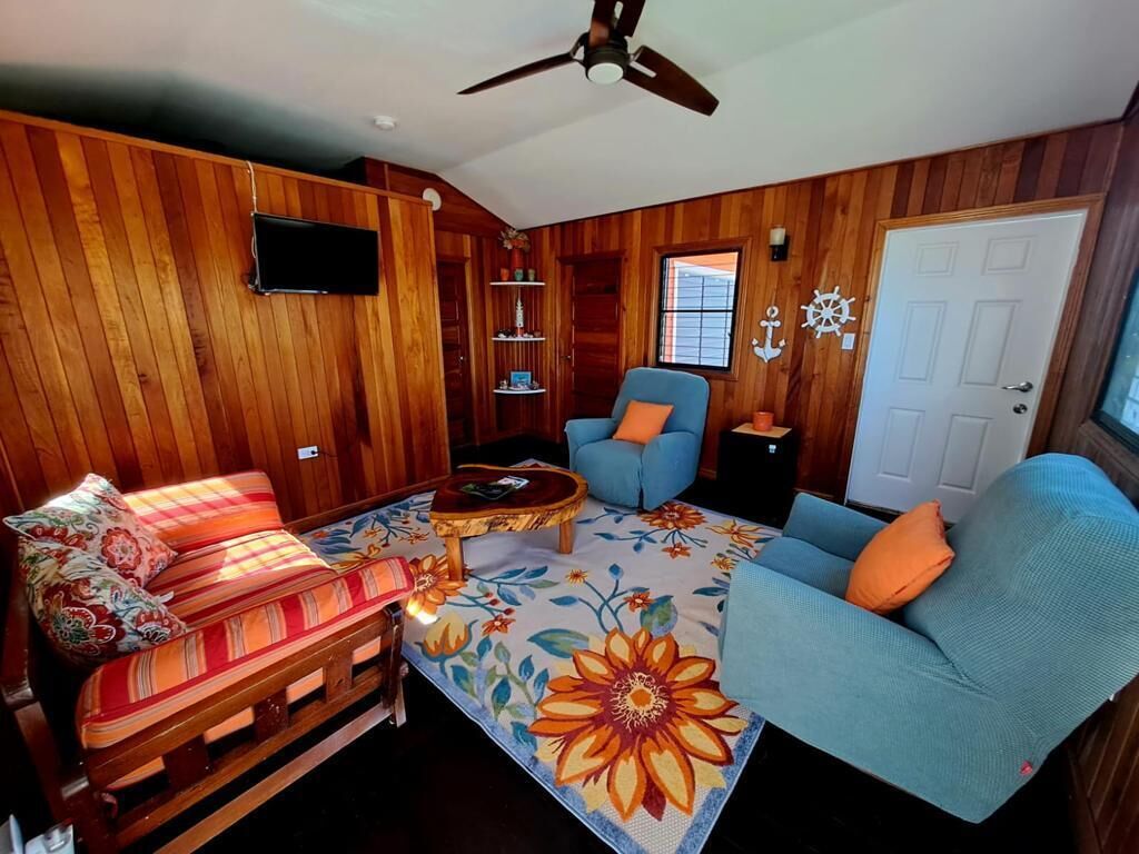 Standard Cottage | Living area | 32-inch Smart TV with digital channels, TV, Netflix