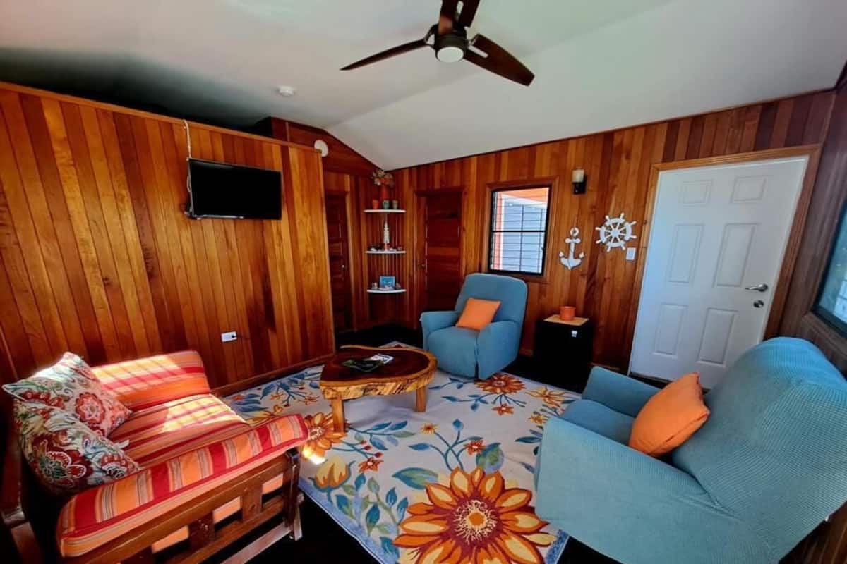 Standard Cottage | Living area | 32-inch Smart TV with digital channels, TV, Netflix