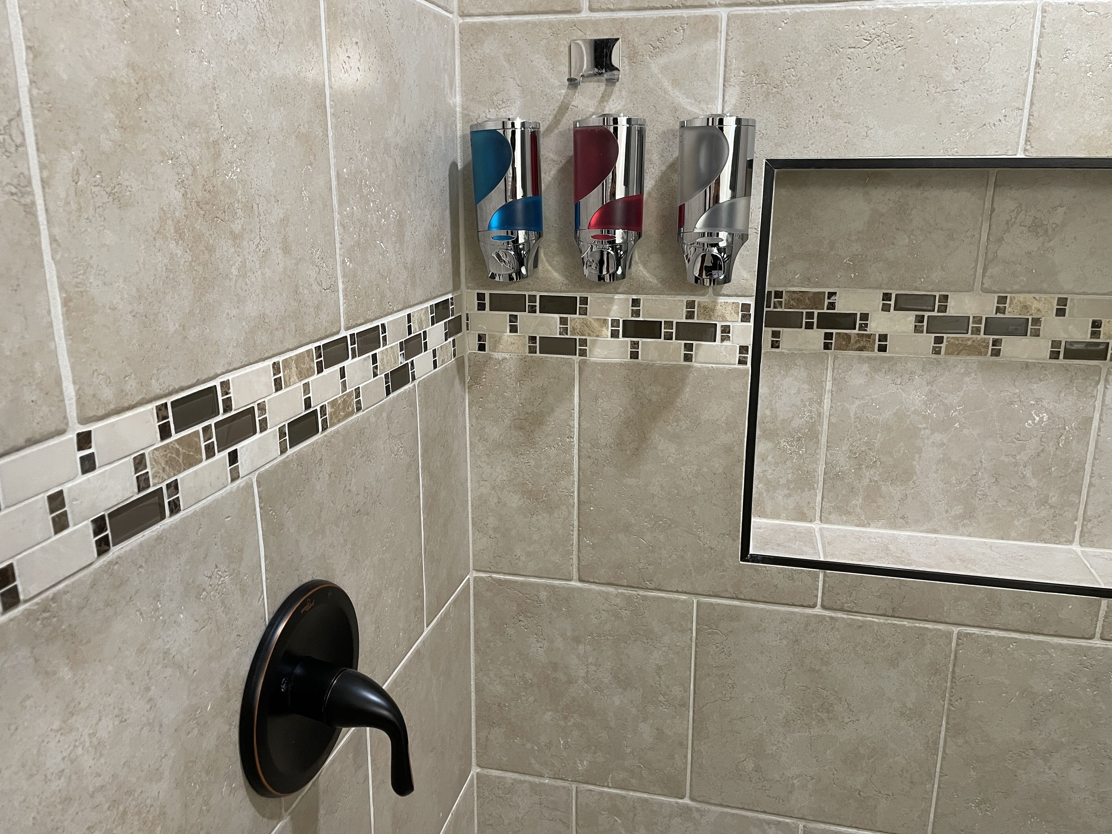 Combined shower/bathtub, hair dryer, towels, soap