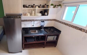 Fridge, microwave, stovetop, coffee/tea maker